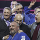 Boris Rotenberg (left, front, wearing a black jacket) and Arkady Rotenberg (right, front, wearing a grey jacket) react during an awarding ceremony of a judo competition in St. Petersburg, 2012.